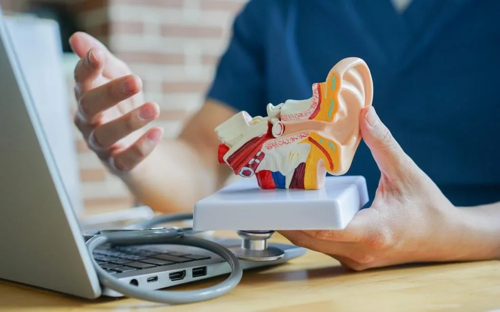 What causes surfer’s ear?